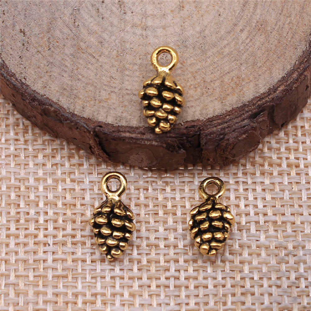 Vintage Fashion Stores - 40 piezas de colgantes de piñones