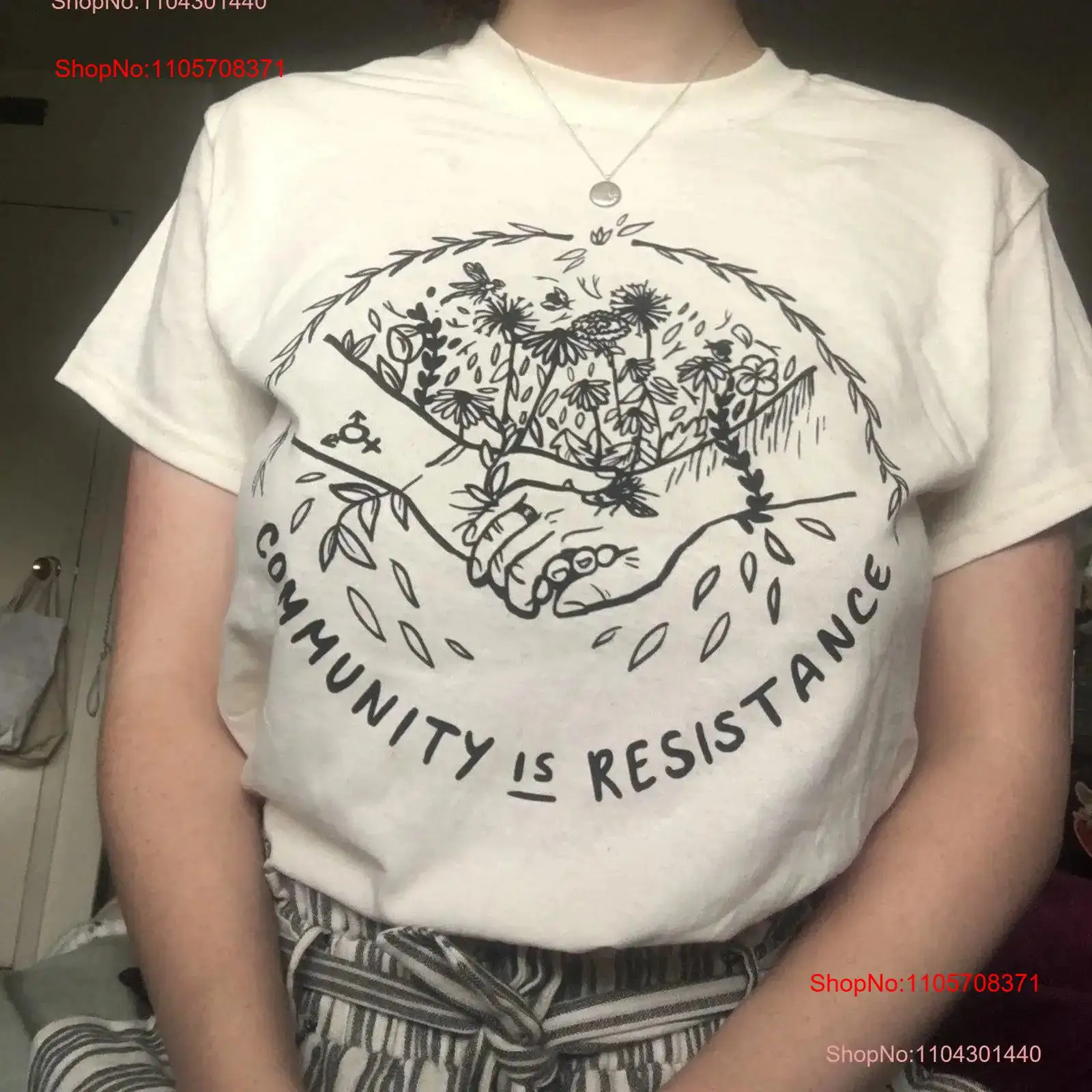 Vintage Fashion Community - Camiseta con estampado 'Community is Resistance',